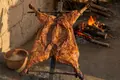 Fire-roasted goat