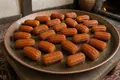 Kosovar syrup-soaked fried pastry