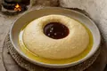 Libyan flour pudding with date syrup or honey