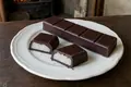Mass-produced filled chocolate bar
