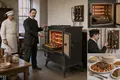 The First Electric Stove Is Demonstrated