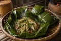 Lao steamed fish in banana leaf
