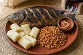 Grilled tilapia with beans and cassava