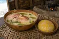 Belizean fish with coconut broth and plantain