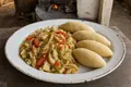 Kittitian saltfish with dumplings