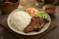 Broken rice with grilled pork chop