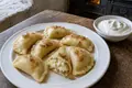 Perogies with sour cream